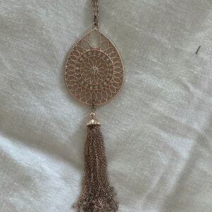 Long rose gold color necklace